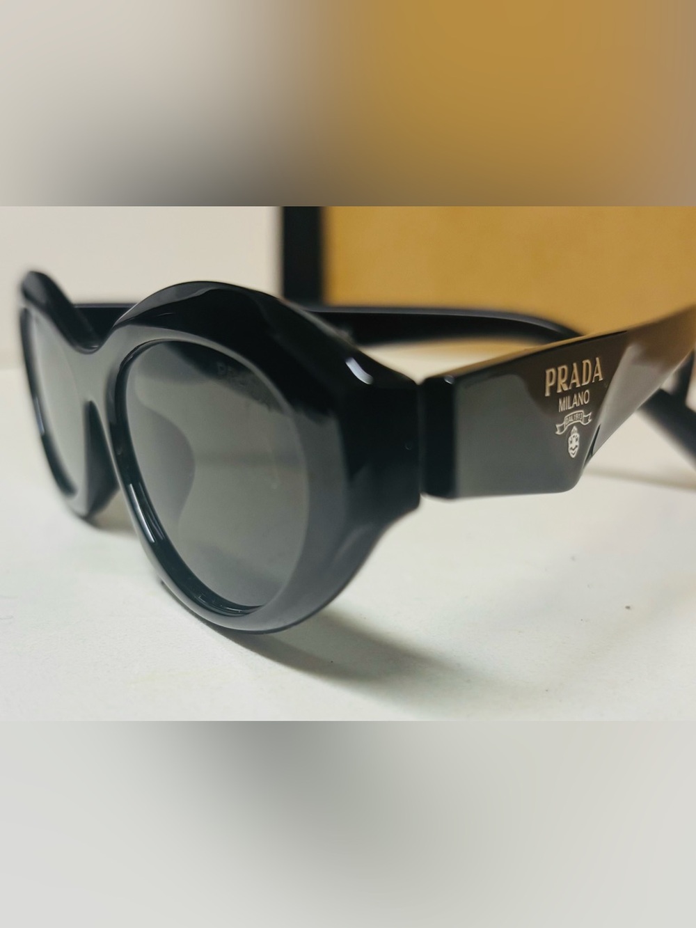 Prada Black Oval Women's Sunglasses